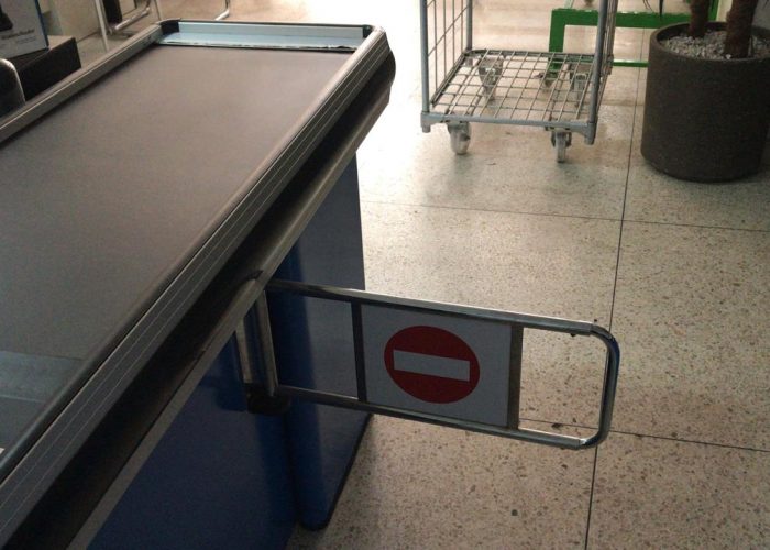 Image annonce: Sortie de caisse tapis roulante