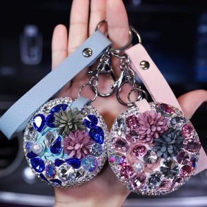 Annonce Accessoires , porte cle diamant en cuir et double miroir