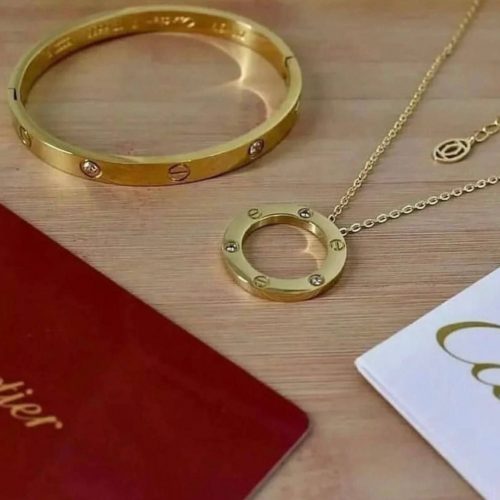 Annonce: Ensemble cartier: bracelet+ collier.