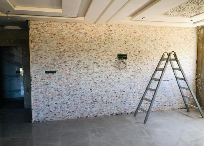 Image annonce: Habillage mural en pierre naturelle – Sur-mesure & sur-commande